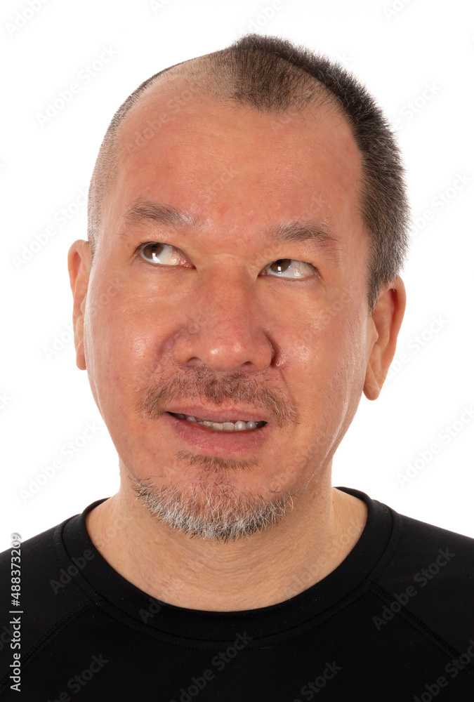 Fototapeta premium Do It Yourself Pandemic Haircut for Man: A Man Looking Surprised After Shaving Off His Head