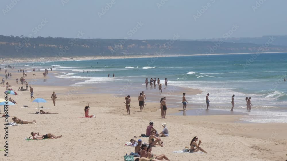 people in the beach in a summer day slow motion 4k people in the beach in a summer day slow motion 4k