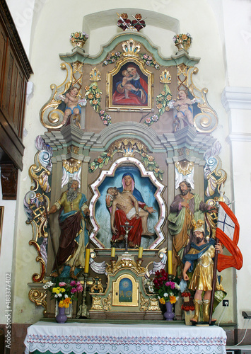 Altar of Our Lady of Sorrows in the Parish Church of St. Peter in Saint Peter Mreznicki, Croatia photo