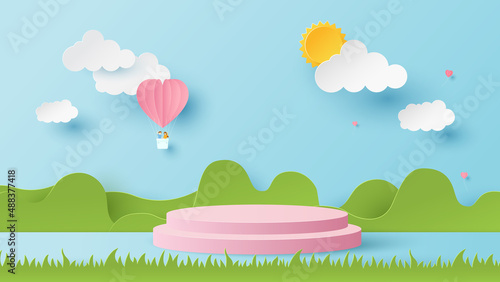 Nature landscape with podium platform to show product. Paper cut and craft style illustration. Heart balloon with couple joyful on flying over clouds. Summer time background_1