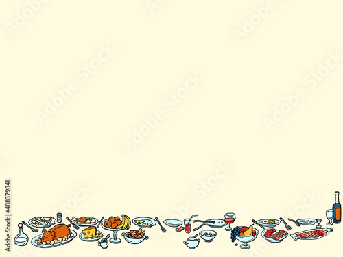 A large table dinner with food, a feast. Served dishes, festive lunch