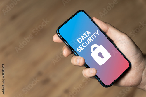 Data Security - hand holding a phone