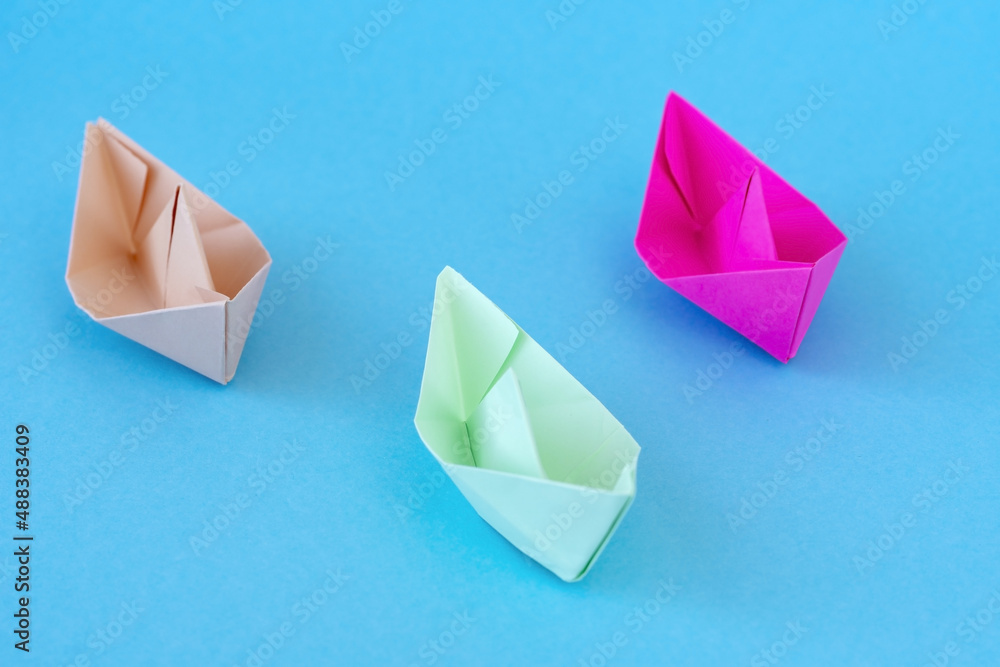 Paper Boats. color paper group of ships on background Paper Boats. color paper group of ships on background