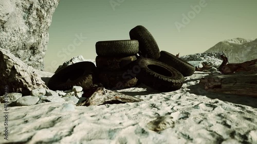 Old car tires on the beach