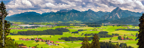 panoramic scene with rural landscape and mountain range in Bavaria, germany