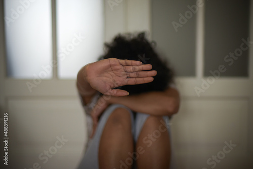 view of a woman protecting herself