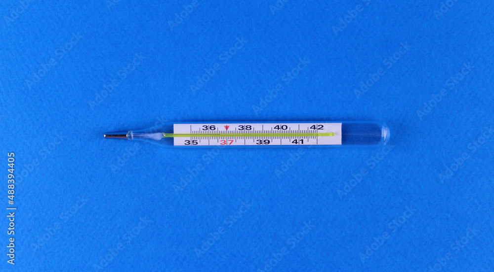 Thermometer on a blue background
