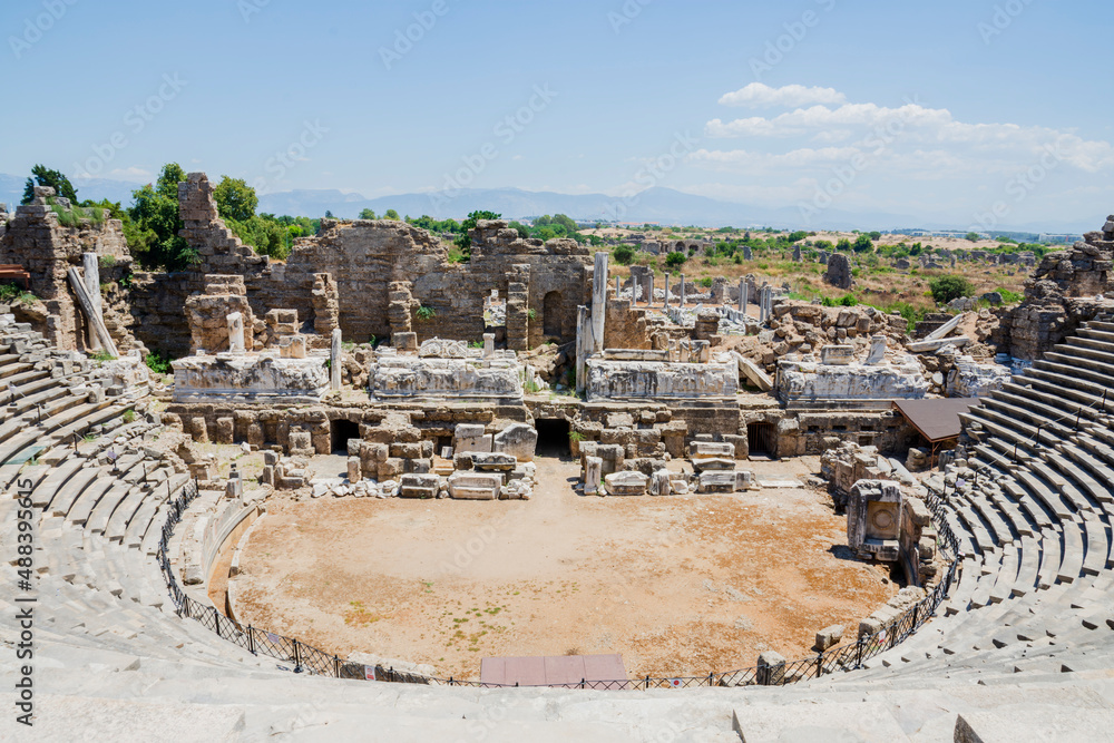 Ancient theater ruins on a sunny day with blue skies