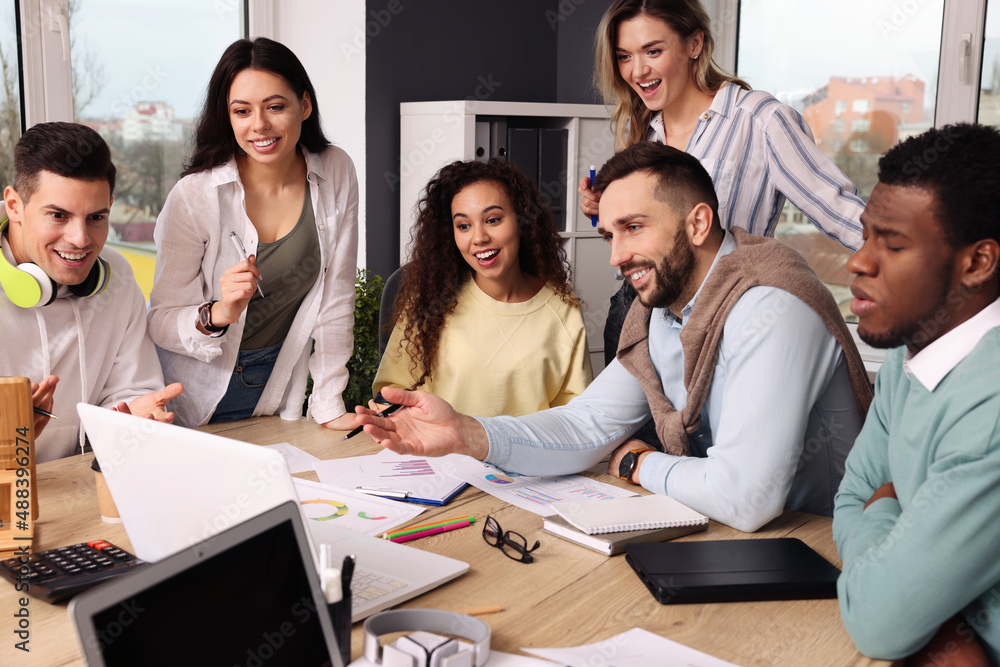 Team of employees working together in office. Startup project Team of employees working together in office. Startup project