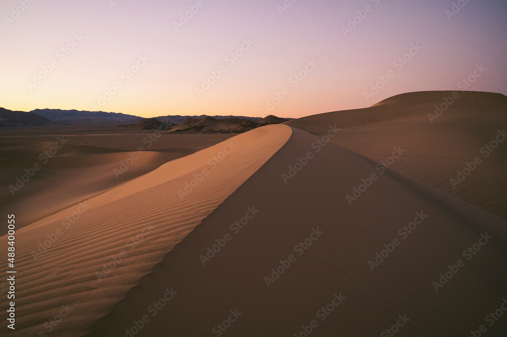 Light and texture on a sand dune at sunset