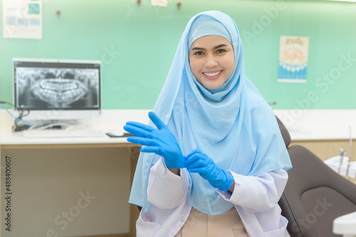 Portrait of female muslim dentist working in dental clinic  teeth check-up and Healthy teeth concept