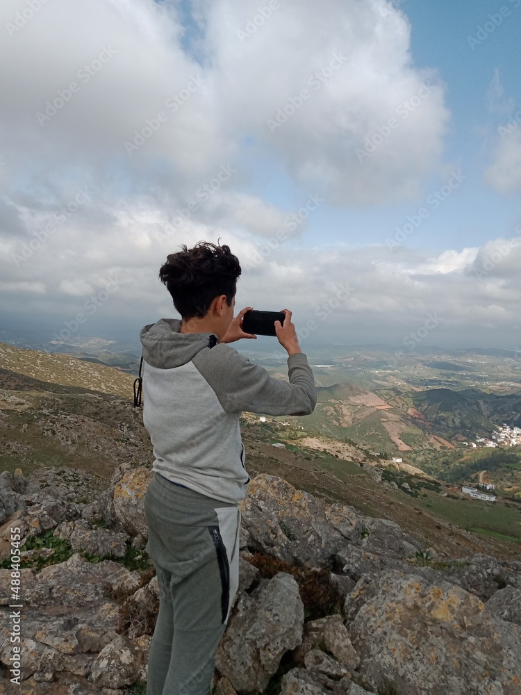 photographer in mountains