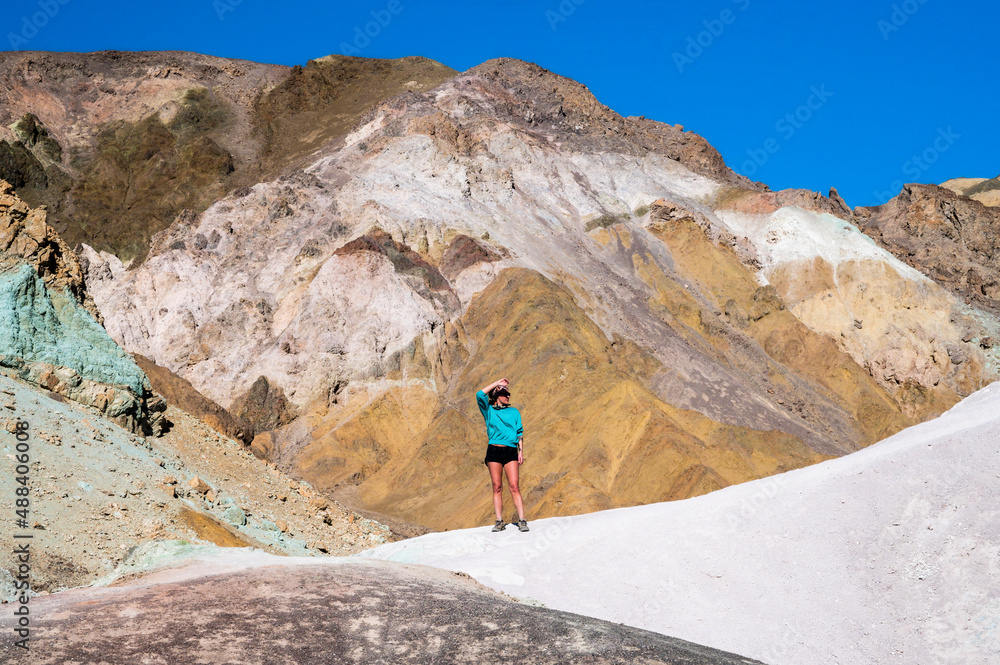 Female standing at Artist Palette in Death Valley National Park Female standing at Artist Palette in Death Valley National Park