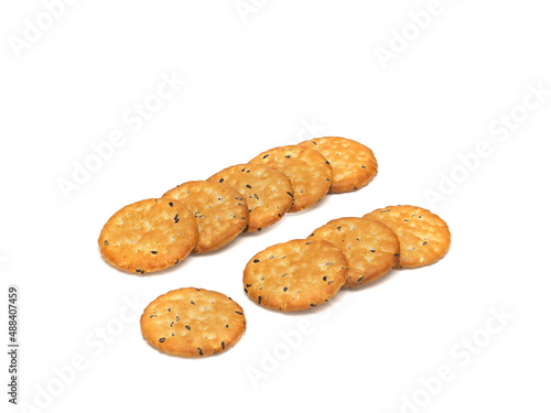 Many delicious crackers on white background, top view