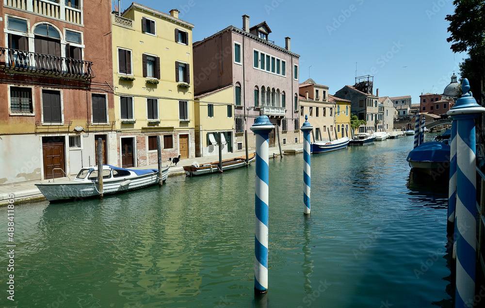 Venice, Italy, canals and historical buildings. Beautiful view of the streets and canals of Venice without tourists