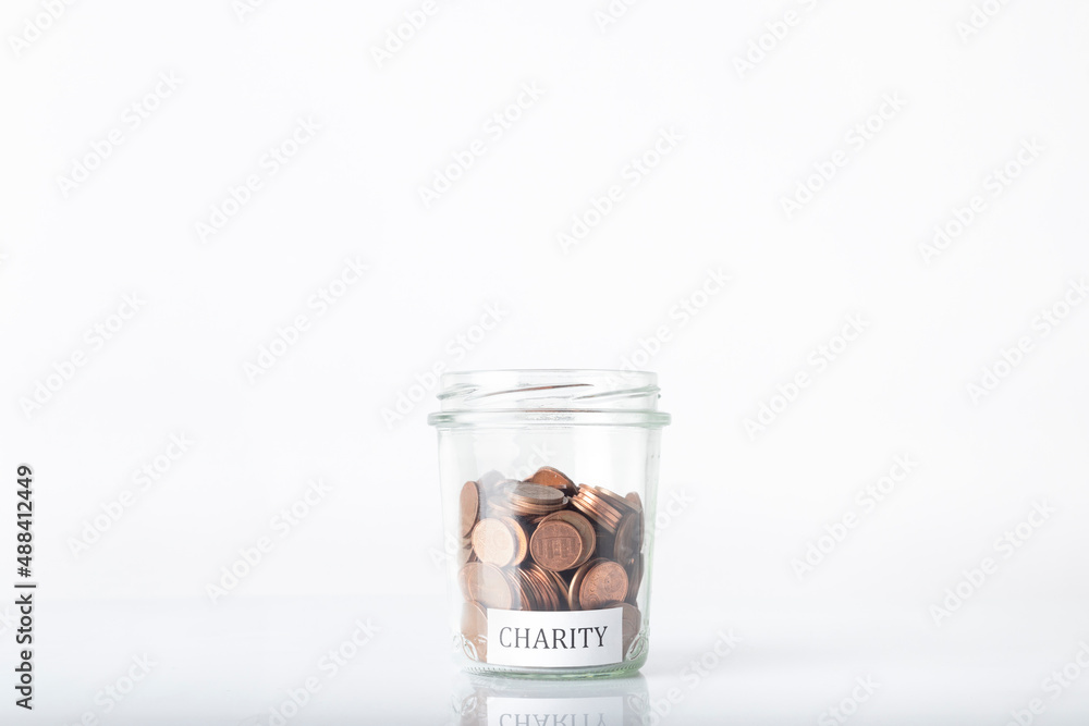 Euro cents with the inscription CHARITY on a white background Euro cents with the inscription CHARITY on a white background