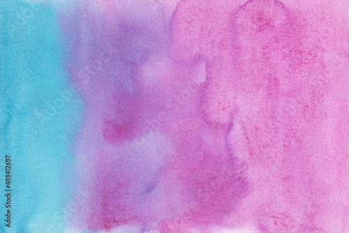 Watercolor deep pink, purple and blue ombre background texture. Stains on paper, hand painted. Beautiful artistic watercolour wallpaper. Liquid backdrop.