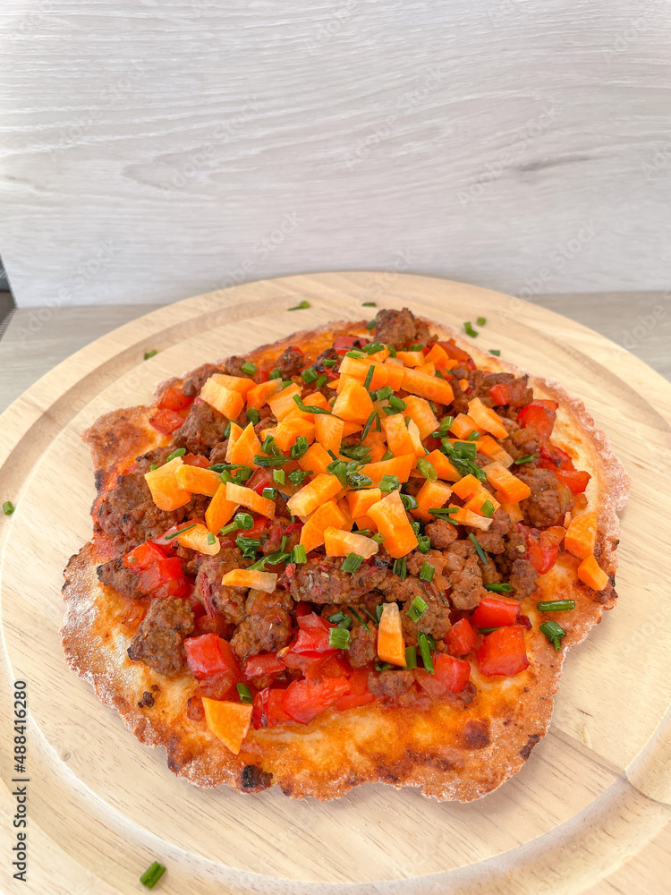 Turkish pide with meat, vegetables and much protein Turkish pide with meat, vegetables and much protein