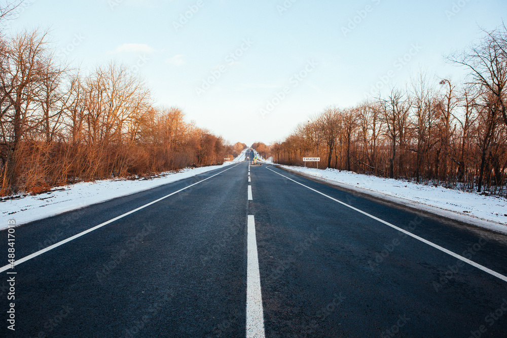 Beautiful winter weather new asphalt road Beautiful winter weather new asphalt road