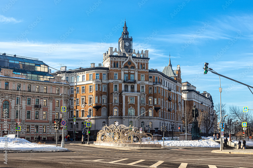 Building with a turret and a clock on Sretensky Boulevard