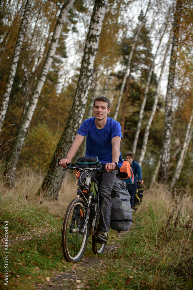 Fototapeta premium Bicyclist in the forest, Russia