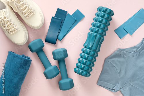 Принти на полотні Fitness gym accessories with feminine sportswear on pink background top view