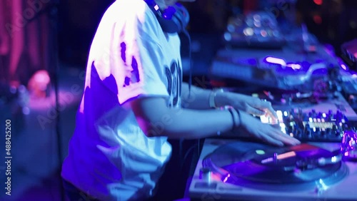 Handheld Shot of DJ Scratching