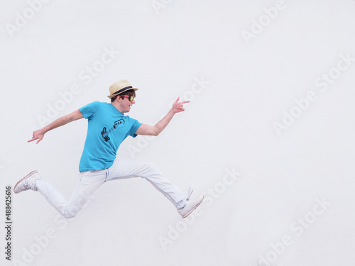 YOUNG BOY JUMPING FROM JOY