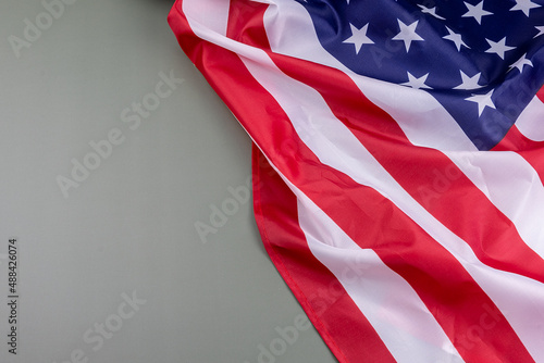 Flag of the United States, on an olive green background with a blank space on the left side photo