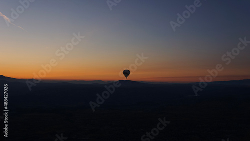 Silhouette of a hot air balloon on the sunrise  Cappadocia  Turkey