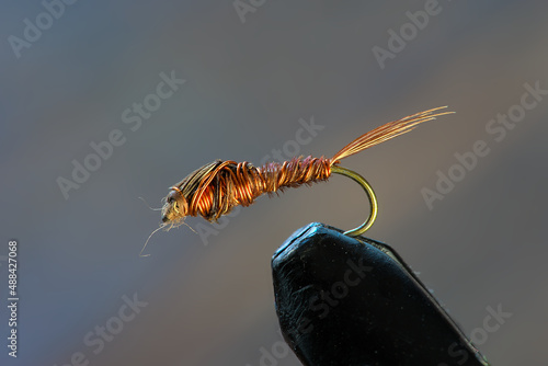 Canvastavla handmade fishing fly, fly tying