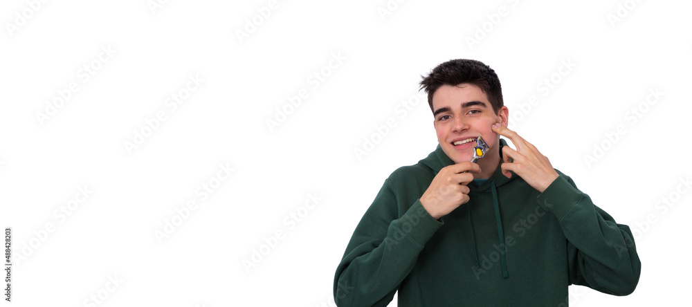 teenager isolated on background with razor teenager isolated on background with razor
