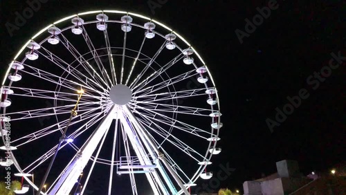 White ferris wheel in the night park