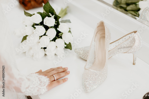 bridal shoes on the table