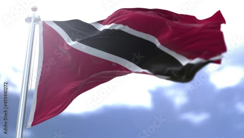 Trinidad and Tobago flag waving against the sky. High quality 4k footage photo