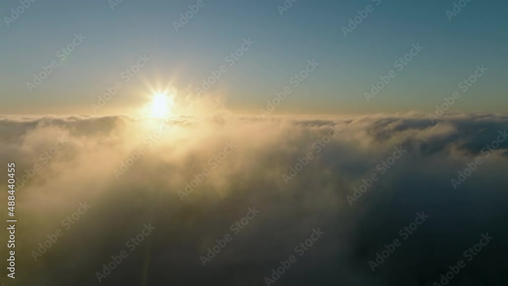 Flight over the cumulus clouds. Top view of the stunning aerial landscape. Flight over the cumulus clouds. Top view of the stunning aerial landscape.