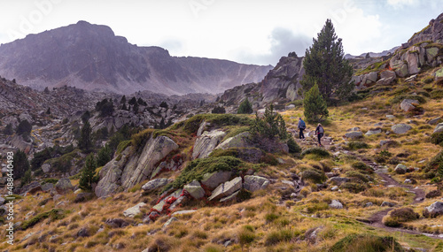 People hiking in the Pyrenees mountains, Andorra, Pessons