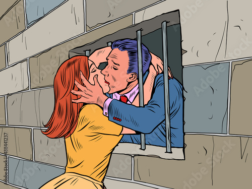 A woman in love kisses her husband, who is in prison. The politician is a political prisoner. Freedom and love