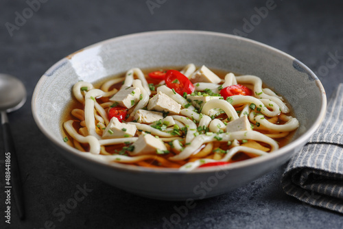 Asian noodle soup served in bowl