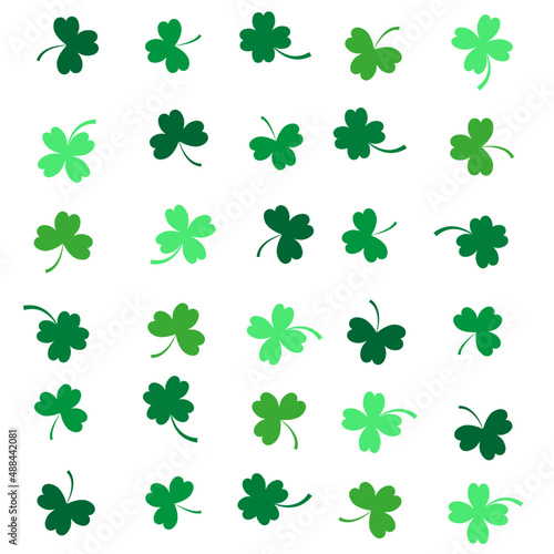 Pattern of green colored clovers on white background