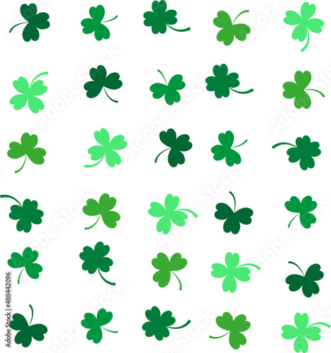 Pattern of green colored clovers on white background 