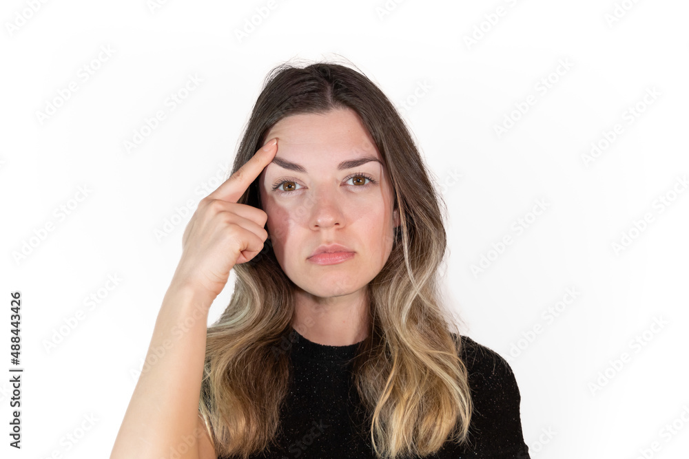 Young girl wants forehead liftmake plastic surgery. Labiaplasty. Medical operations. Facial Aesthetics. Isolated white background. Young girl wants forehead liftmake plastic surgery. Labiaplasty. Medical operations. Facial Aesthetics. Isolated white background.