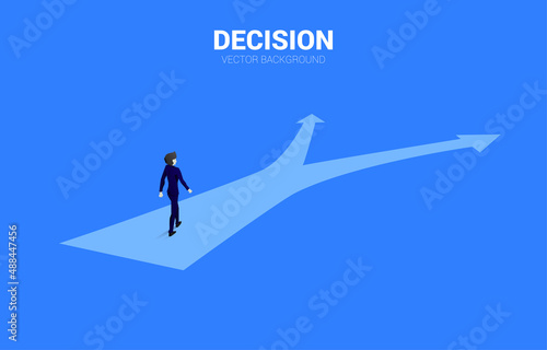 Silhouette of businessman walking at crossroad. Concept of time to make decision in business direction