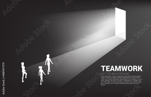 Silhouette of businessman and businesswoman walking to exit door. Concept of career start up and business solution.
