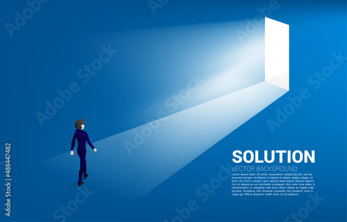 Silhouette of businessman walking to exit door. Concept of career start up and business solution.