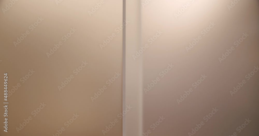 The transparent sliding door opens into Dressing Room with wardrobe for clothes. Home Wardrobe with Clothing. Modern Minimalist Sliding Door. Modern Dressing Room. The transparent sliding door opens into Dressing Room with wardrobe for clothes. Home Wardrobe with Clothing. Modern Minimalist Sliding Door. Modern Dressing Room.