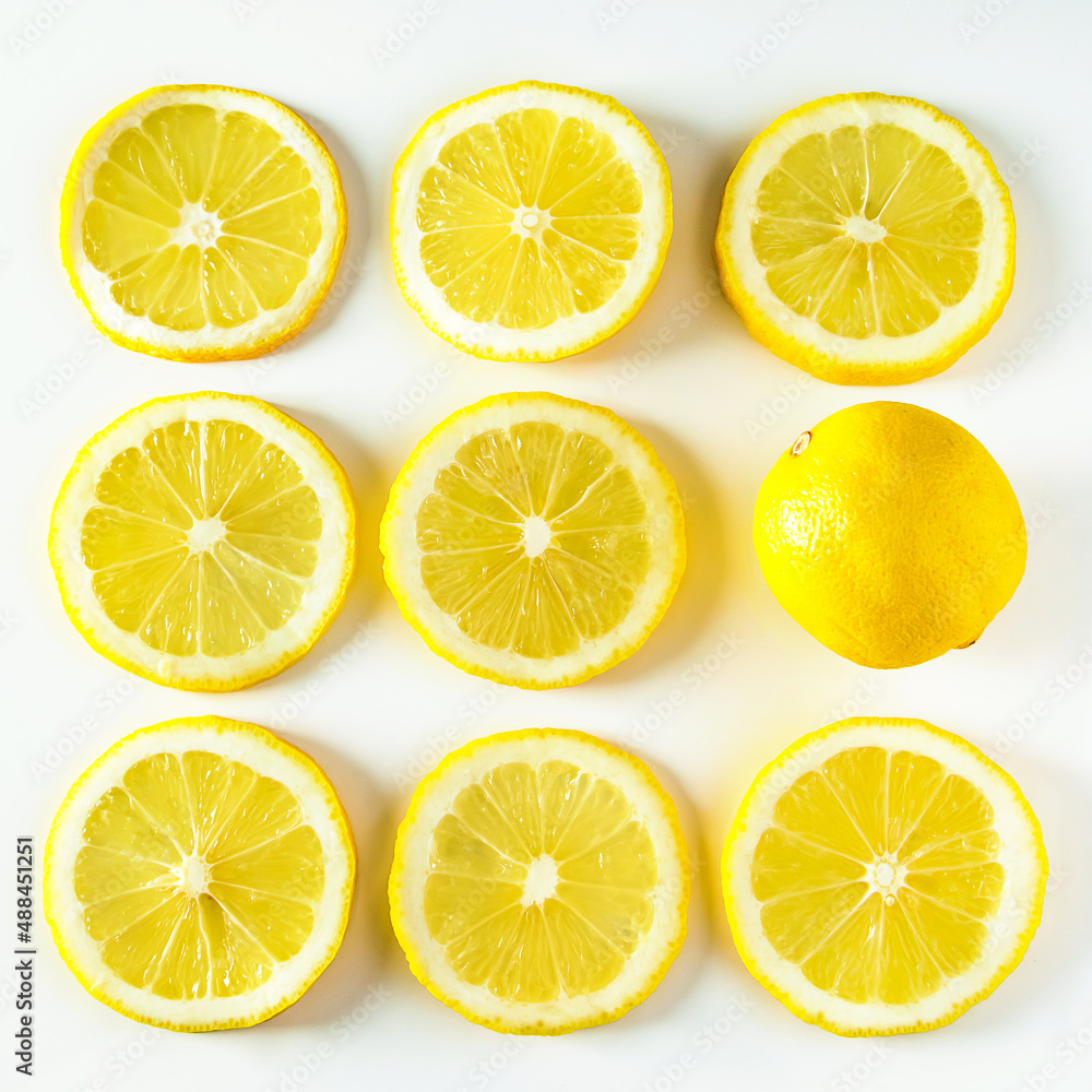 Background from fresh juicy lemons close-up. Pattern of ripe yellow citrus