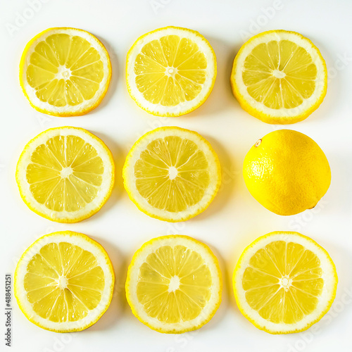Background from fresh juicy lemons close-up. Pattern of ripe yellow citrus