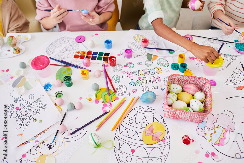 Background image of children painting Easter eggs and coloring books while enjoying art and craft class together Background image of children painting Easter eggs and coloring books while enjoying art and craft class together
