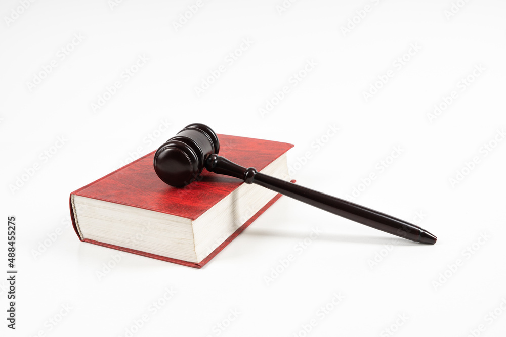 Law concept - law book with a wooden judge's gavel on table. Copy space for text Law concept - law book with a wooden judge's gavel on table. Copy space for text